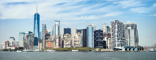 Photo of a New York City waterfront, with many skyscrapers visible.