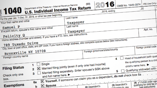 A photo of part of a U.S. tax form. It contains information such as first and last name, address, and filing status (single, married, etc).